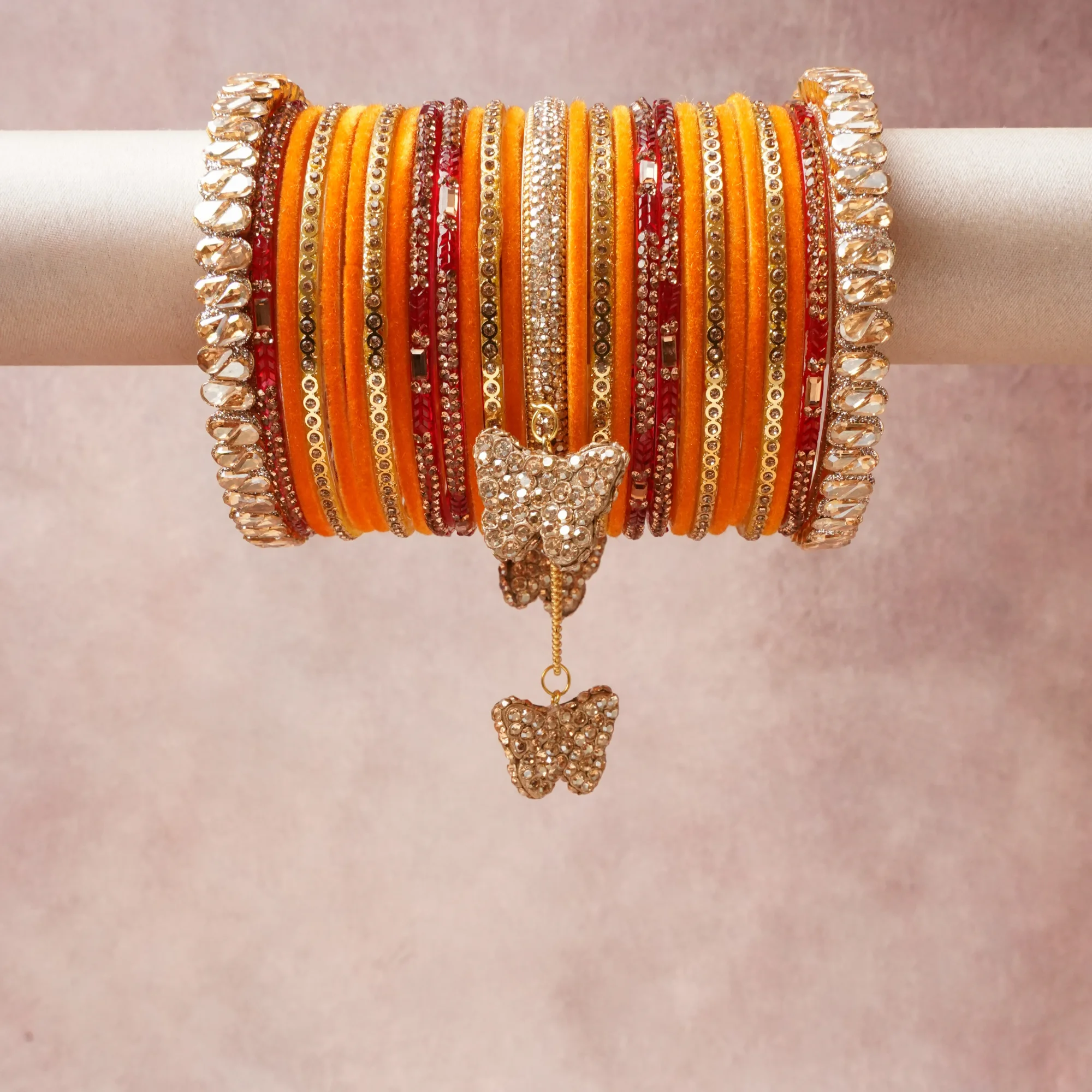 A commanding Orange anchors this beautiful set, enriched with accents of Deep Red, Gold, Champagne Crystal that add depth and dimension.

Featuring a striking composition of Velvet, Glass, Metal, Faceted Crystals, this set carries intricate craftsmanship and strong presence. Grand in form, it is created for moments that deserve to be marked.
